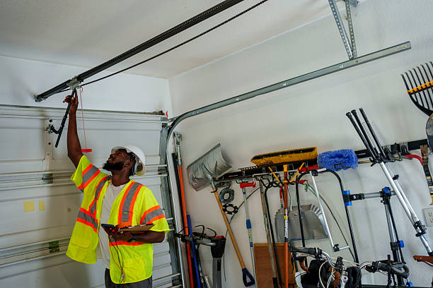 Professional Garage Door Panel Replacement technician working in Lyons, KS