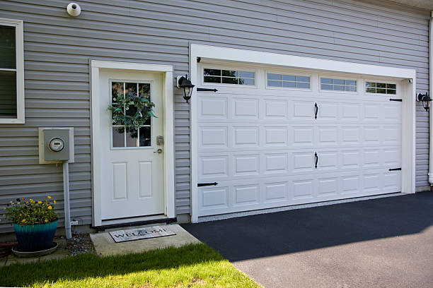 24/7 Emergency Garage Door Panel Replacement experts in Lyons, KS